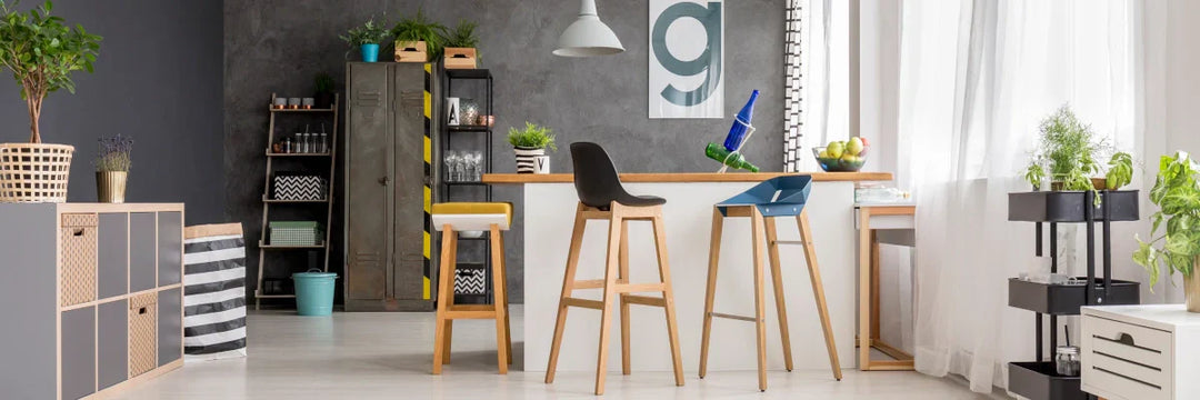 White farmhouse style console cabinet or display credenza with glass doors and X-pattern detailing, showcasing neutral-toned crockery and books.