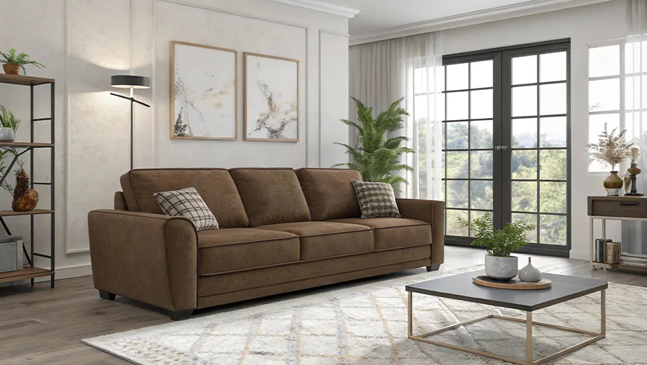 tan leather sofa in a modern open-plan apartment